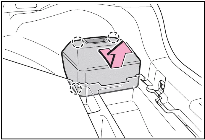 Removing the 12-volt battery cover - Toyota Prius 2024